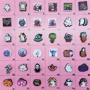 May include: A collection of 36 Halloween themed charm designs. The charms are made of resin and feature various characters, including ghosts, pumpkins, witches, and more. The charms are arranged in a grid pattern on a pink background.