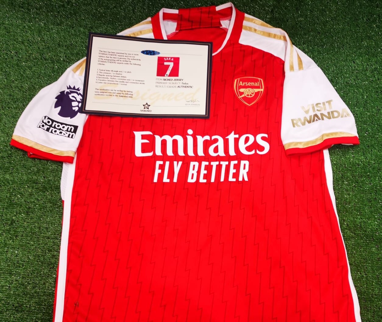 saka signed arsenal shirt