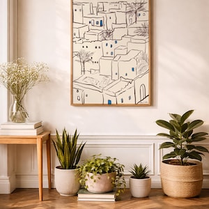 Minimal art print depicting a Tunisian village with traditional Mediterranean architecture in soft neutral tones