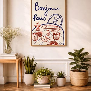 This hand-drawn digital illustration captures a classic Parisian breakfast with baguette, coffee, croissant, butter, and petits biscuits, inspired by slow mornings in France.