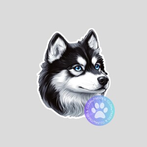 May include: A sticker featuring a detailed illustration of a Husky dog's head. The dog has black and white fur, bright blue eyes, and a friendly expression. A circular logo with a paw print is in the lower right.