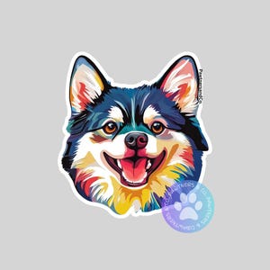 May include: A colorful, stylized illustration of a dog's face. The dog has black and white fur with a bright yellow, orange, and red background. The dog is smiling with its tongue sticking out. The text "PawtnersandCo." is visible in the upper right corner of the image.