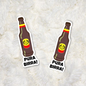 May include: Two white stickers with a brown beer bottle illustration and the text "Pura Birra!" in black.