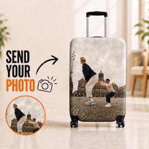 May include: A rolling suitcase with a custom photo print. The image on the suitcase features two people posing in front of a building. The text "SEND YOUR PHOTO" is printed on the left side of the suitcase.