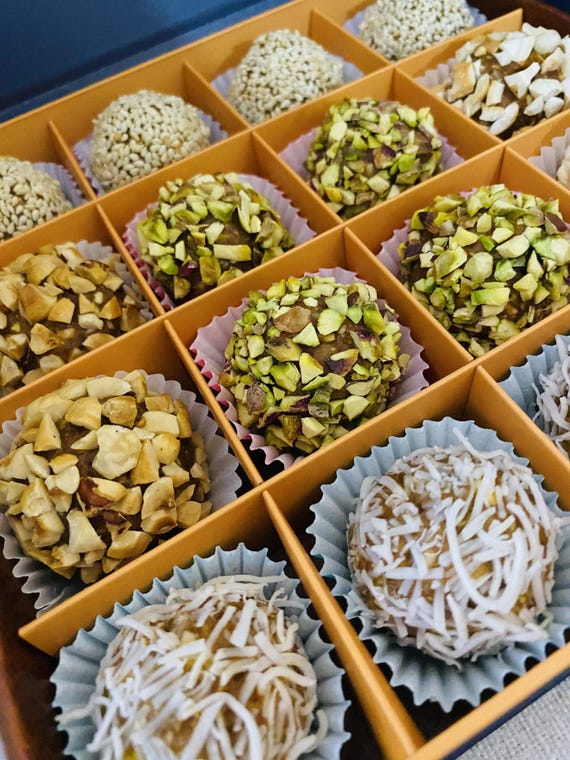 Date paste mixed with nuts, topped with assorted nuts, energy food, luxury gift box, greetings card for all occasions, gift for loved ones !