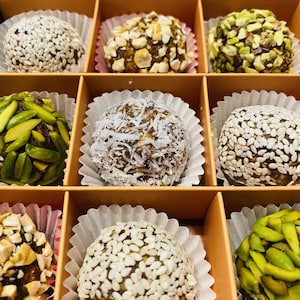 Date paste mixed with nuts, topped with assorted nuts, vegetarian, luxury gift box, greetings card for all occasions, gift for loved ones !