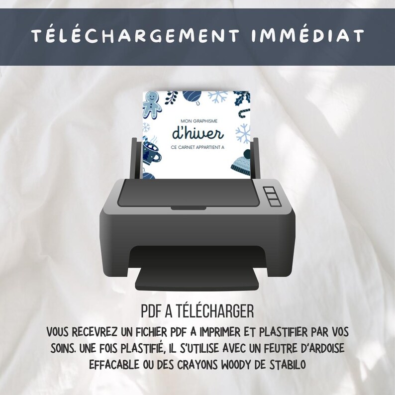 May include: A black and white illustration of a printer with a white sheet of paper in the tray. The paper has a blue and white winter-themed design with the text "MON GRAPHISME d'hiver CE CARNET APPARTIENT A". The text below the printer reads "PDF A T&Eacute;L&Eacute;CHARGER VOUS RECEVREZ UN FICHIER PDF A IMPRIMER ET PLASTIFIER PAR VOS SOINS. UNE FOIS PLASTIFI&Eacute;, IL S'UTILISE AVEC UN FEUTRE D'ARDOISE EFFACABLE OU DES CRAYONS WOODY DE STABILO".