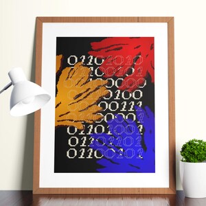 May include: A framed art print with a black background, displaying colorful hand-shaped designs in red, orange, and blue. White binary code is overlaid on the artwork. The print is on a dark wooden desk with a white desk lamp and a small potted plant.