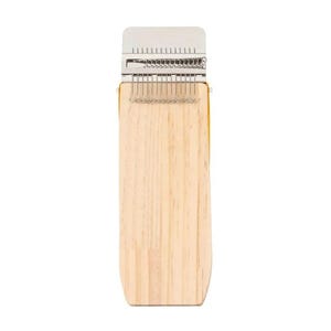 May include: A wooden kalimba instrument with a light wood grain finish. It features a metal tine bridge and a series of metal tines for plucking. The instrument is rectangular with rounded edges and a silver metal top.