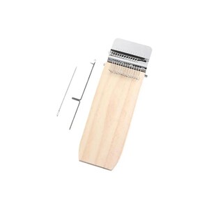 May include: A wooden weaving loom with a metal comb and a metal needle. The loom is made of light-colored wood and has a rectangular shape with a curved bottom. The metal comb is at the top of the loom.