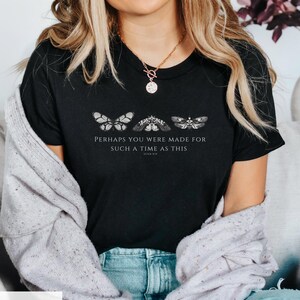 May include: Black t-shirt with a white graphic of three butterflies and the text "Perhaps you were made for such a time as this, Esther 4:14".
