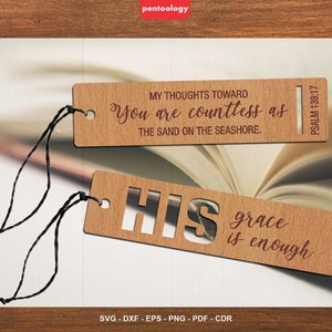 May include: Two wooden bookmarks with a brown wood grain finish. The top bookmark has the text "My thoughts toward you are countless as the sand on the seashore. Psalm 139:17". The bottom bookmark has the text "His grace is enough".