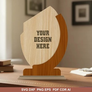 May include: A wooden award plaque featuring a light-coloured, oval-shaped front panel with the dark text YOUR DESIGN HERE, supported by a darker, curved wooden base structure that extends along the right side of the plaque in a vertical arc.
