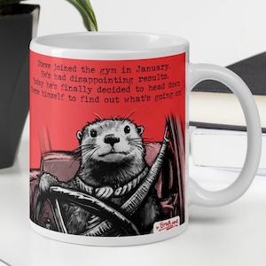 May include: White ceramic mug with a red background and a cartoon otter driving a car. The text on the mug reads: "Steve joined the gym in January. He's had disappointing results. Today he's finally decided to head down there himself to find out what's going on!"