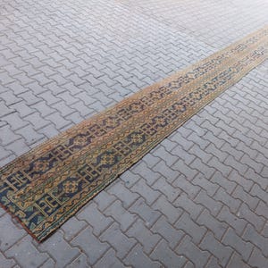 May include: A set of three ceramic mugs with a speckled, matte finish. Each mug features a different color: light blue, cream, and gray. The mugs have a simple, modern design with a rounded shape and a comfortable handle.