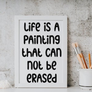 a picture of a sign that says life is a painting that can not be erase