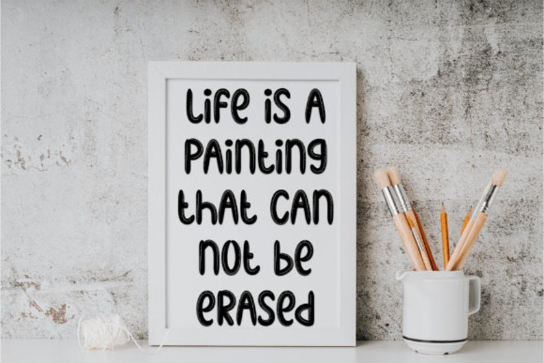 a picture of a sign that says life is a painting that can not be erase