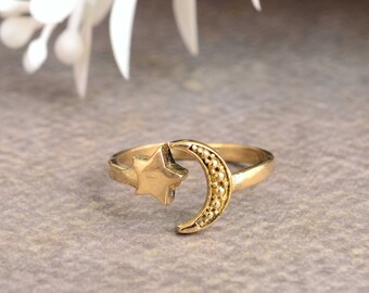 Gouden maansikkel en sterring: verstelbare hemelse boho-ring