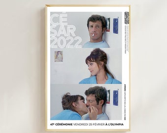 May include: A poster for the 47th César Awards ceremony, held on Friday, February 25th at the Olympia. The poster features a black and white photo of a couple in a romantic embrace. The text on the poster reads "César 2022" and "47e cérémonie vendredi 25 février à l'Olympia".