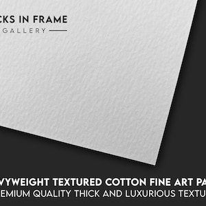 May include: White textured fine art paper with the text "FLICKS IN FRAME GALLERY" and "HEAVYWEIGHT TEXTURED COTTON FINE ART PAPER PREMIUM QUALITY THICK AND LUXURIOUS TEXTURE".