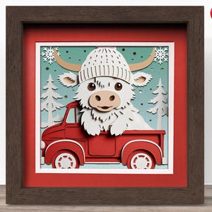 May include: A white highland cow wearing a white knit hat is sitting in the back of a red pickup truck. The truck is driving through a snowy winter scene with pine trees and snowflakes.