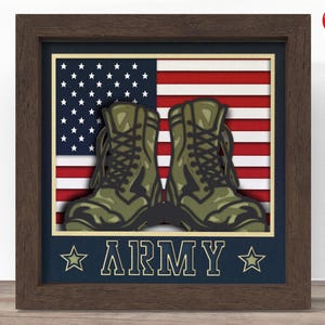 May include: A framed papercraft artwork featuring a pair of green army boots against a red, white, and blue American flag background. The text "ARMY" is displayed below the boots.