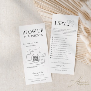 Puede incluir: Dos tarjetas blancas con texto negro. Una dice "BLOW UP our PHONES" con un gráfico de cámara y un código QR. La otra dice "I SPY..." con una lista de indicaciones. Ambas tarjetas tienen los nombres "Sammy & Tim" y la fecha "12 de marzo de 2023".