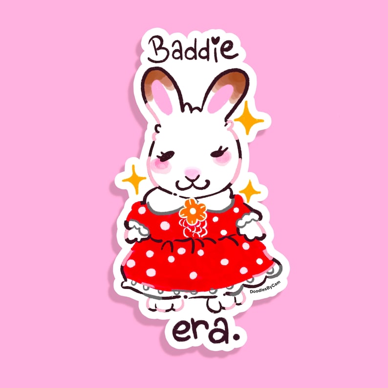 May include: A white bunny wearing a red dress with white polka dots and a flower on the collar. The bunny has brown ears and closed eyes. The text "Baddie era." is below the bunny.