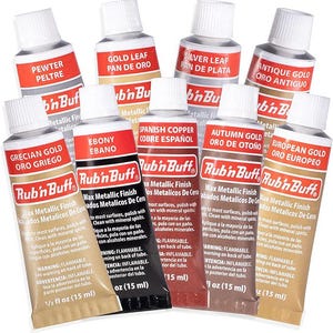 May include: Ten bottles of Rub'n Buff wax metallic finish in various colours, including pewter, gold leaf, silver leaf, antique gold, Grecian gold, ebony, Spanish copper, autumn gold, and European gold. Each bottle is labelled with the colour name in both English and Spanish. The bottles are 1/2 fl oz (15 ml) each.