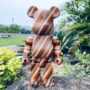 BE@RBRICK 400% Karimoku Sculpture carved from diagonal layers of aged beech, ebony, maple, rosewood and walnut