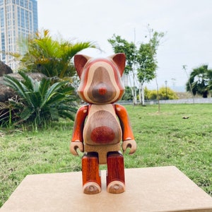 BE@RBRICK NYABRICK 400% Karimoku Sculpture carved in vertical layers of aged beech, ebony, maple, rosewood and walnut