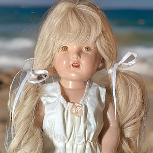 Unmarked Composition Doll.  24 inches