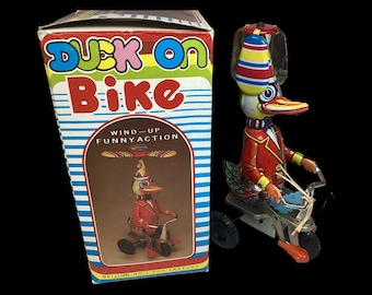 ビンテージ ゼンマイ式おもちゃ 子供 赤ちゃん 時計 トミー イルカ