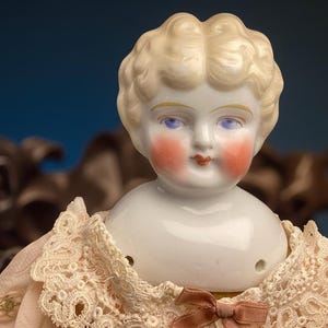 Exquisite 18-inch German Antique China Head Doll – Wooden Limbs
