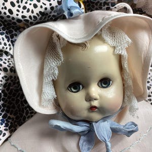 Vintage 1940s Baby Doll – 15” – Hard Plastic and Rubber – Pink Satin Jacket, White Gown & Bonnet – Unmarked Sweetheart