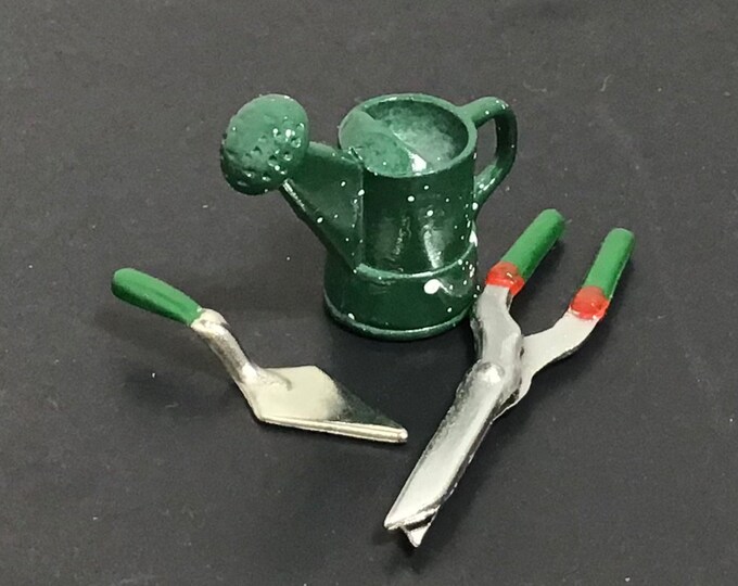 Miniature doll house gardening tools