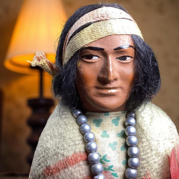 Vintage 1940s Skookums Doll – 9.75 Inches Tall with Blanket, Feather and Beaded Necklace