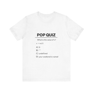 May include: White t-shirt with the text "POP QUIZ" above a math problem: "What is the value of x?" with multiple-choice answers. The answers are A) 0, B) "", C) undefined, and D) your weekend is ruined.