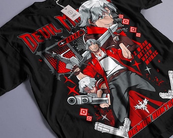 May include: Black t-shirt with a red and white graphic of a video game character. The graphic includes the text "Devil May Cry", "Dante", and "I work better with music".