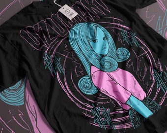 May include: Black t-shirt with a pink and blue graphic design of a woman with long blue hair. The text "UZUMAKI" is written in pink letters on the shirt.