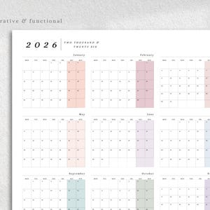 May include: A white 2026 calendar with monthly layouts. Each month has a different pastel color highlight. The text "Decorative & functional" is at the top left. The year "2026" is displayed prominently.