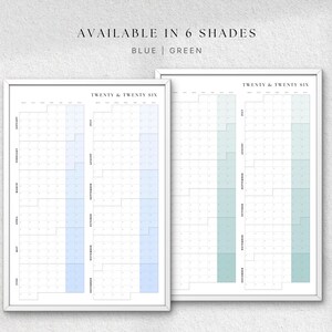 K&ouml;nnte beinhalten: Zwei gerahmte Jahreskalender, einer blau und einer gr&uuml;n, mit dem Text "AVAILABLE IN 6 SHADES" oben. Die Kalender sind mit "TWENTY & TWENTY SIX" beschriftet und zeigen Monate und Daten. Der Hintergrund ist hellgrau.