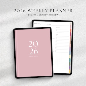 May include: Two digital tablets displaying a 2026 weekly planner. One tablet shows a pink cover with the year 2026, and the other displays a weekly agenda layout with colour-coded tabs. The text "2026 WEEKLY PLANNER" and "DIGITAL YEARLY AGENDA" are visible.