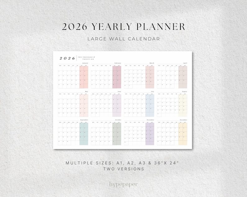 May include: A 2026 yearly wall calendar with a minimalist design. The calendar features a grid layout with each month displayed. The months are color-coded in pastel shades. The text "2026 Yearly Planner" is at the top. Multiple sizes are available.