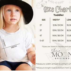 May include: Size chart for toddler clothing with measurements in inches and centimeters. The chart shows sizes 2T, 3T, 4T, and 5-6T with corresponding width and length measurements.