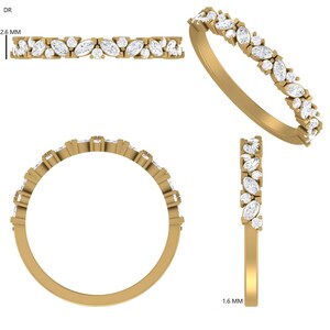 May include: A gold band ring with alternating marquise and round-cut white gemstones. The ring is shown from multiple angles, including a top-down view, a side view, and a close-up of the gemstones. The band is 1.6 mm thick and 2.6 mm wide.