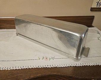 Vintage Priscilla Ware aluminum rectangular bread pan with feet and snap on lid.