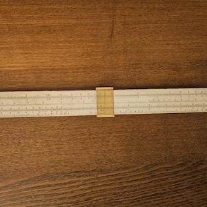 May include: A rustic wooden sign with the text "Welcome to our home" in white lettering. The sign features a distressed finish and a simple, inviting design, perfect for a front porch or entryway.