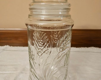 Vintage 1982 Planters Peanuts Glass Jar with Lid Wheat Design - Mr. Peanut on Top and Bottom - Made by Anchor Hocking