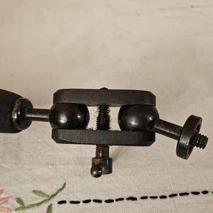 May include: A rustic wooden sign with the text "Welcome to our home" in white lettering. The sign features a distressed finish and a simple, inviting design, perfect for entryway decor.